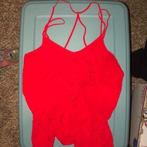 Super cute and flattering flowy and strapy top